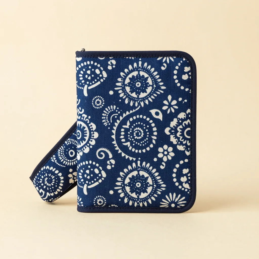 A batik tablet sleeve in an indigo pattern on a light background